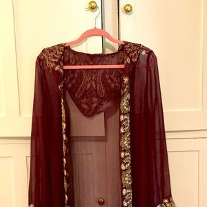 100% Silk Robe/Kimono s/m never worn, no labels. Color is burgundy.